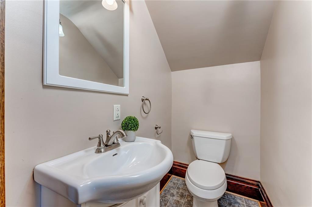 474 Scott Run Road Sycamore, PA 15364 - Photo 15 of 25 a bathroom with a sink and a toilet