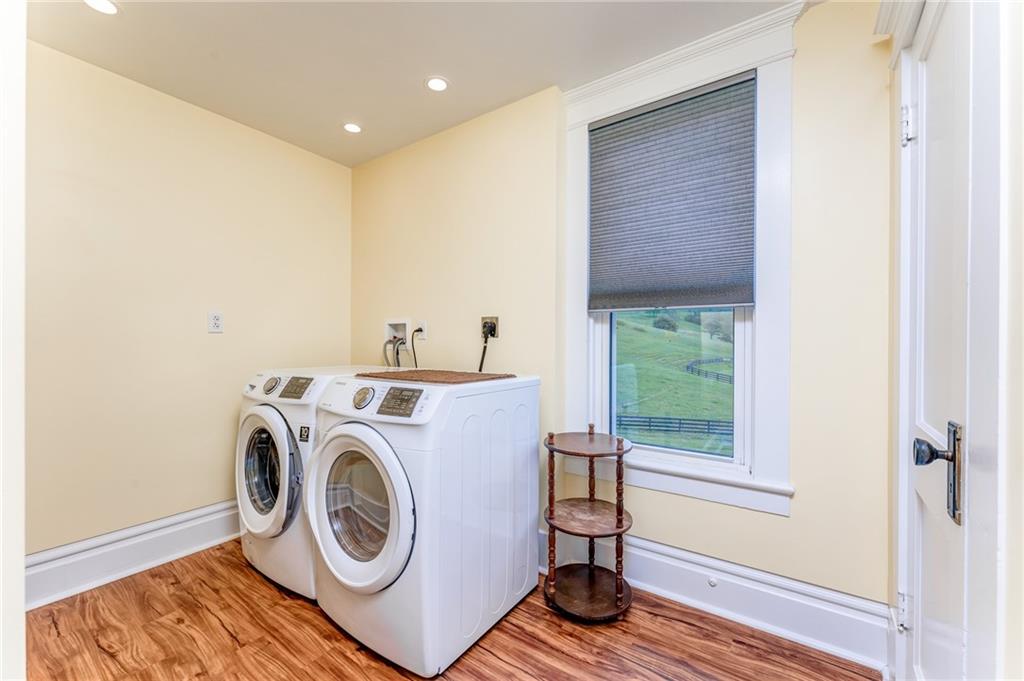 474 Scott Run Road Sycamore, PA 15364 - Photo 19 of 25 a storage room with washer and dryer