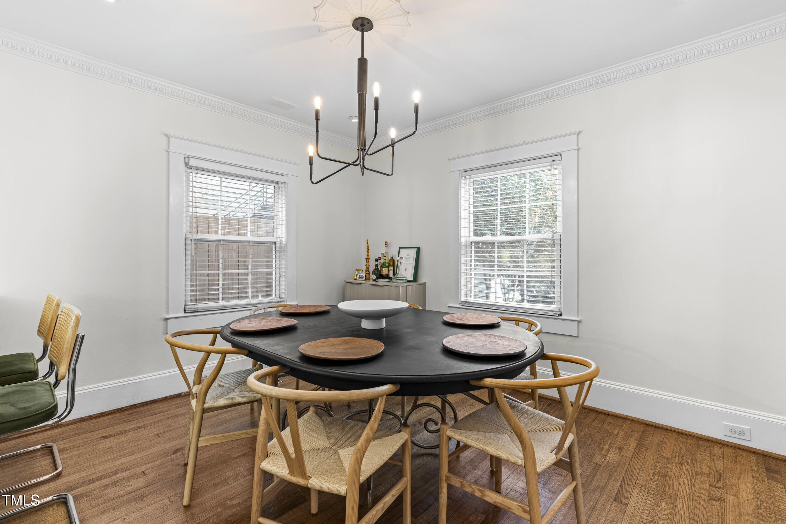 1314 Wake Forest Road Raleigh, NC 27604 - Photo 15 of 32 a view of a dining room with furniture window and wooden floor
