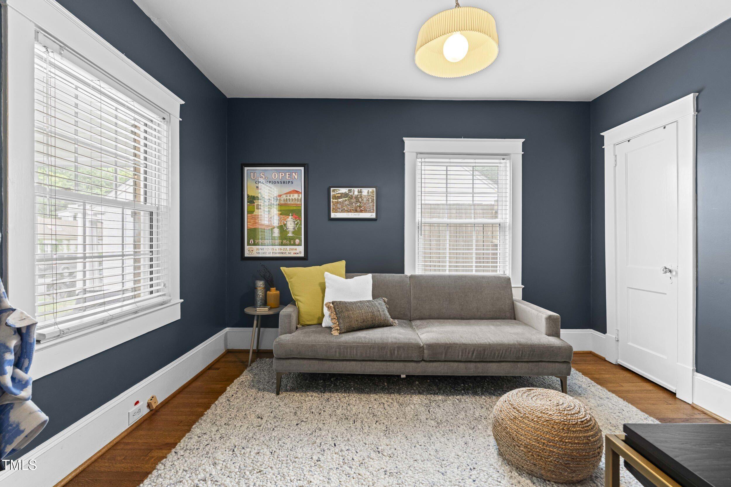 1314 Wake Forest Road Raleigh, NC 27604 - Photo 20 of 32 a living room with furniture and a window