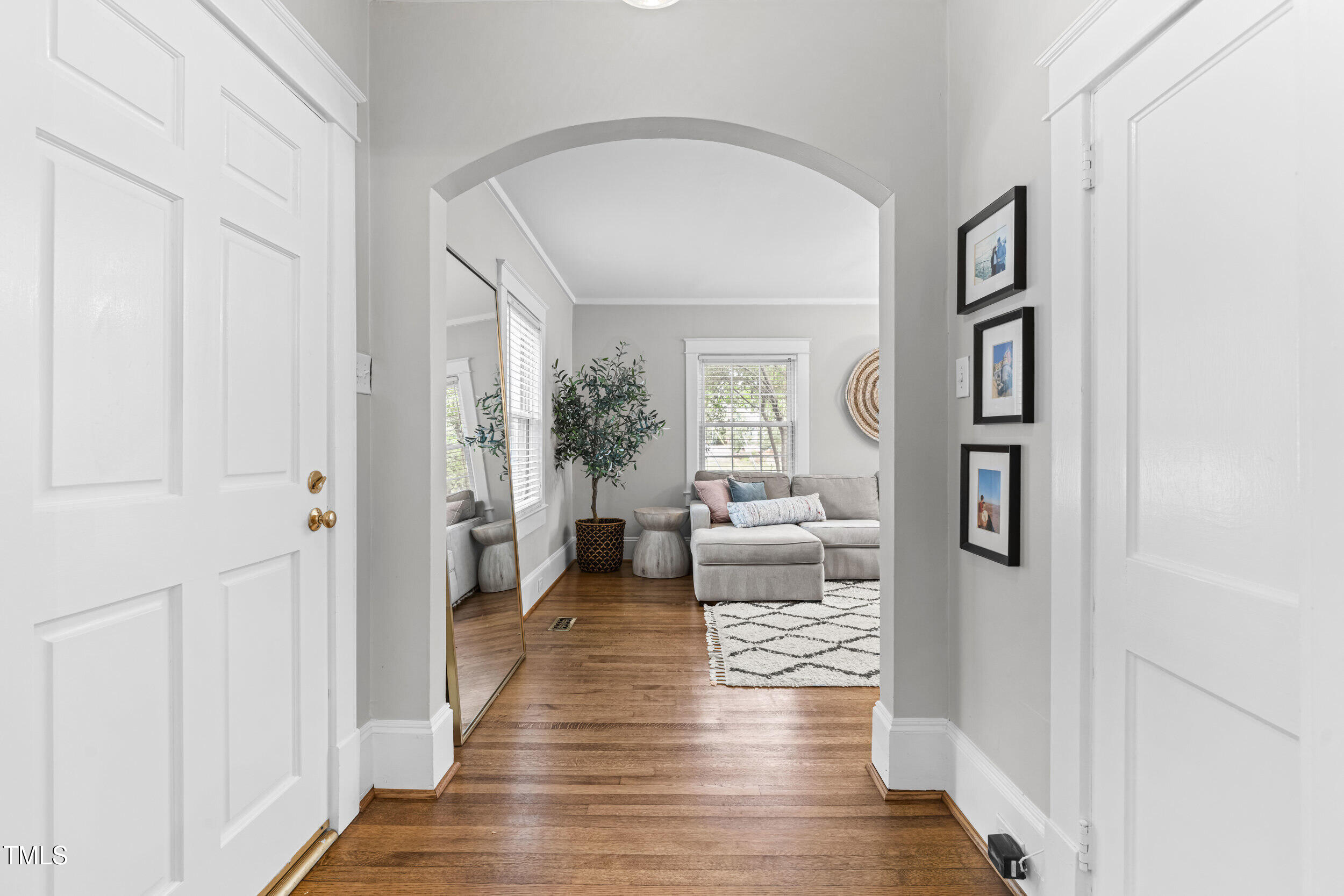 1314 Wake Forest Road Raleigh, NC 27604 - Photo 2 of 32 a living room with furniture and wooden floor