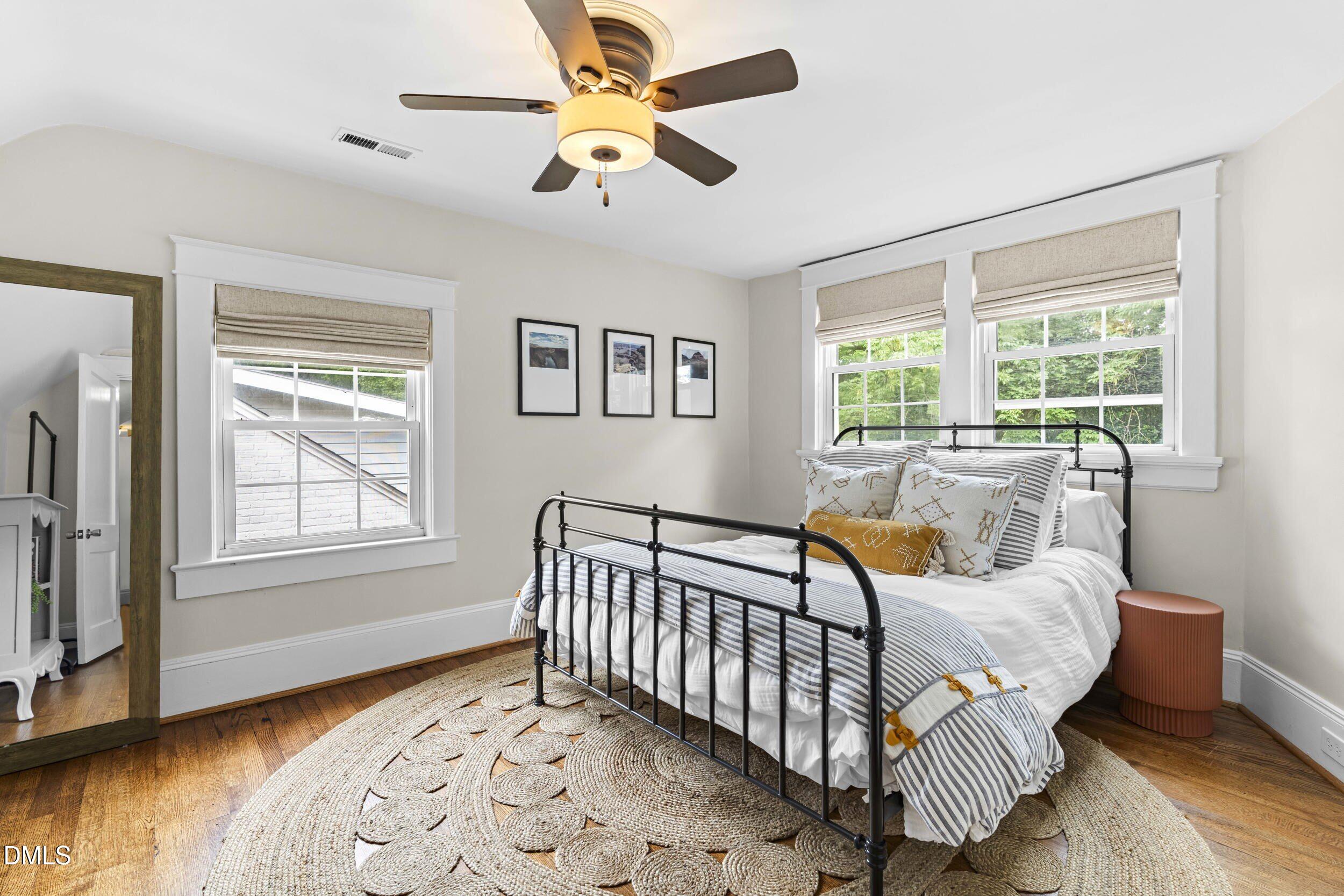 1314 Wake Forest Road Raleigh, NC 27604 - Photo 23 of 32 a bedroom with furniture and a window