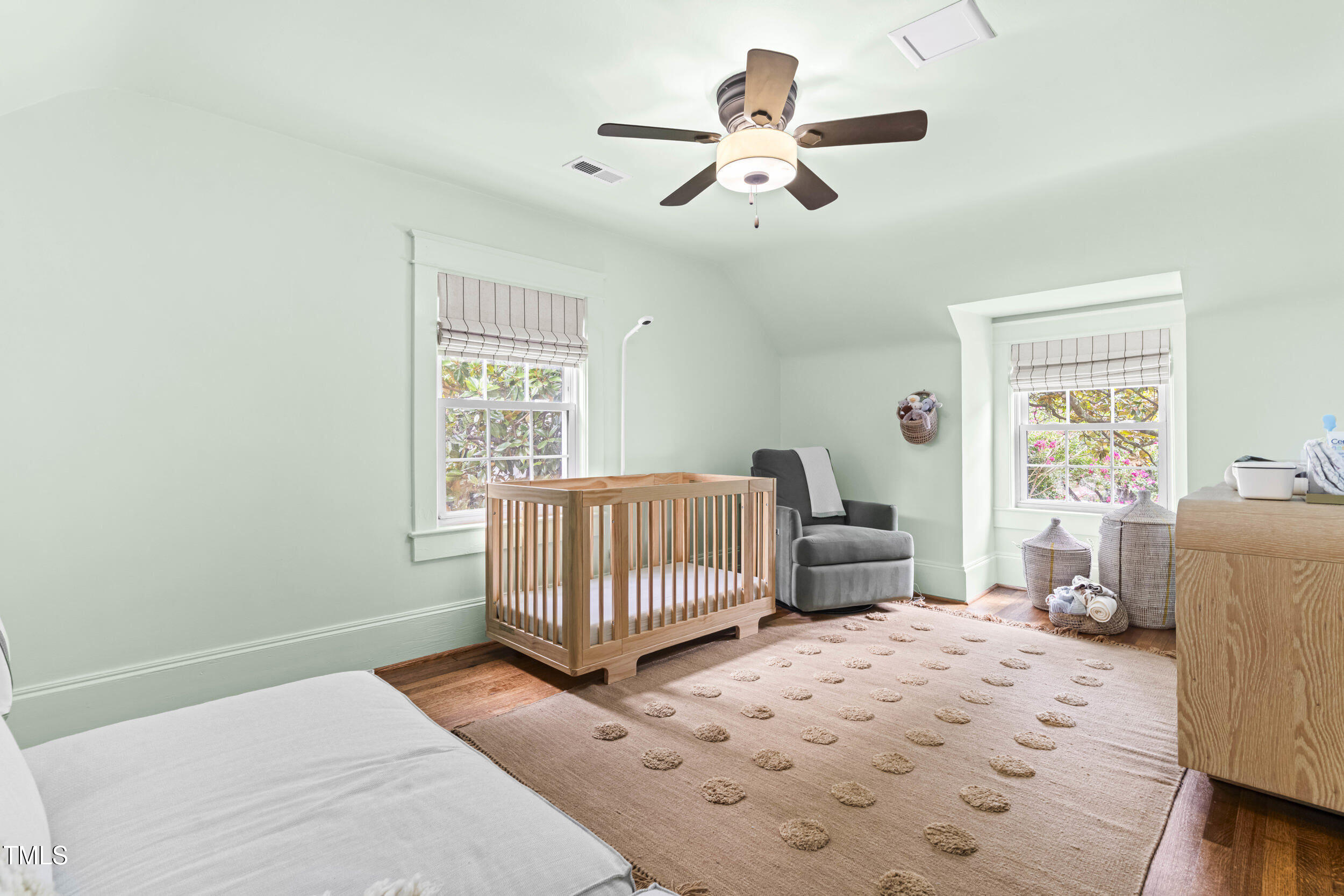 1314 Wake Forest Road Raleigh, NC 27604 - Photo 24 of 32 a bedroom with a bed and furniture