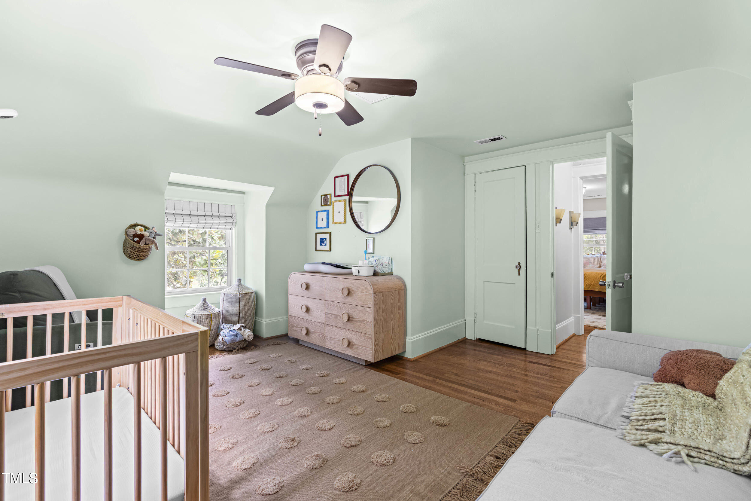1314 Wake Forest Road Raleigh, NC 27604 - Photo 25 of 32 a bedroom with furniture and a large window