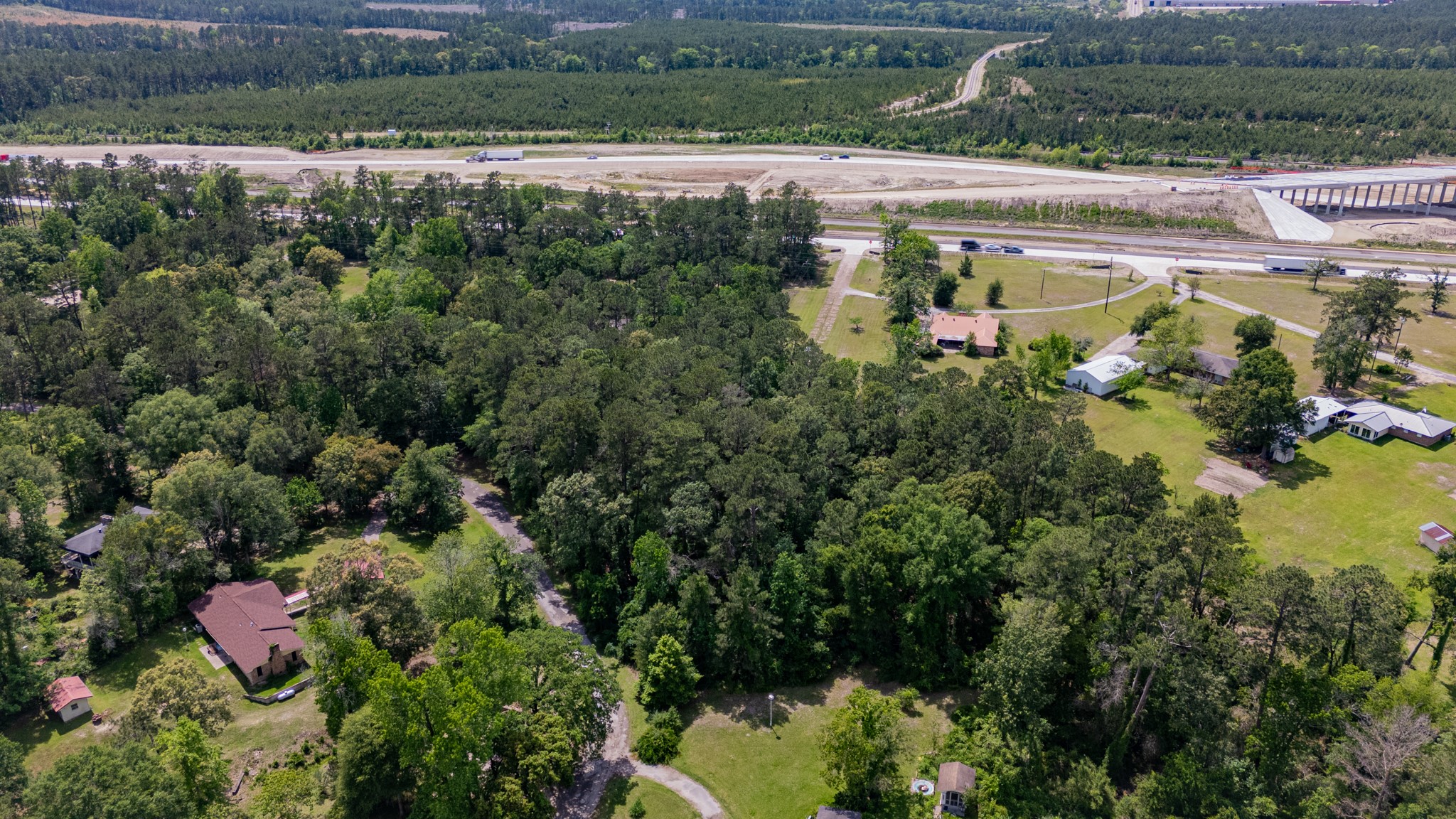 Tbd West Laurelia Road Corrigan, TX 75939 - Photo 4 of 12 an aerial view of residential houses with outdoor space and trees