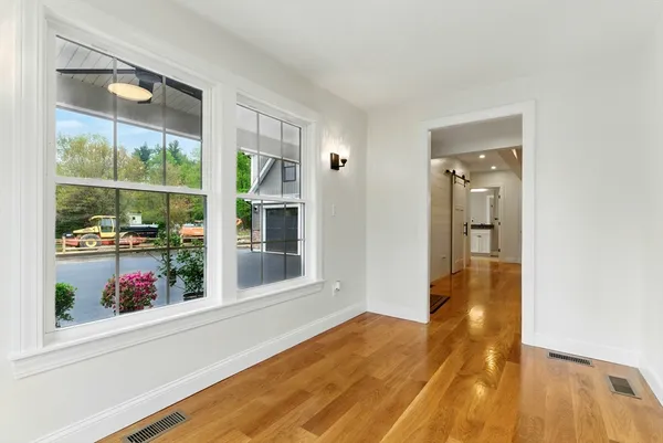 wooden floor in a room with a window