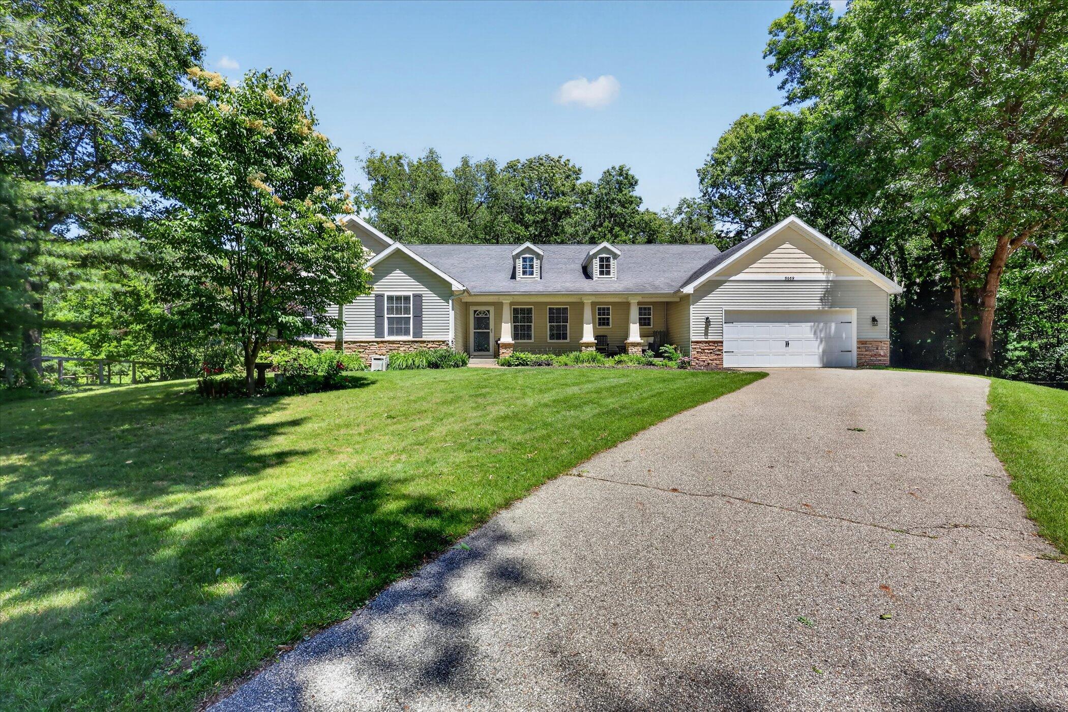 8669 Lilly Ridge Drive Alto, MI 49302 - Photo 2 of 53 03-8669-Lilly-Ridge-Dr-Alto-WindowStill