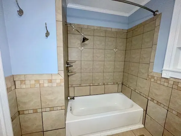 a bathroom with a bathtub