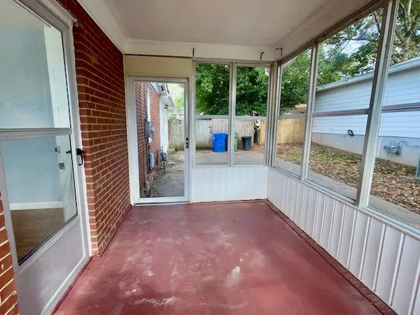 a view of a hallway with an entryway