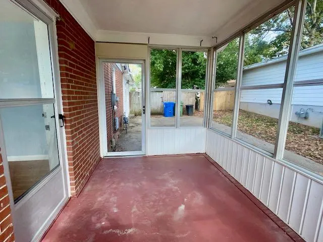 a view of a hallway with an entryway