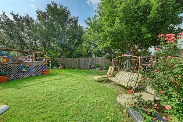 a garden view with a seating space