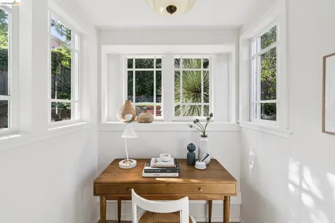 a bathroom with a sink and a window