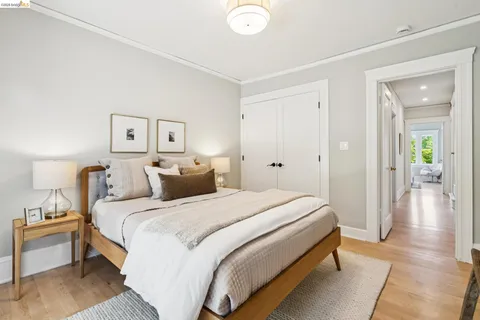 a bed room with a bed and a lamp