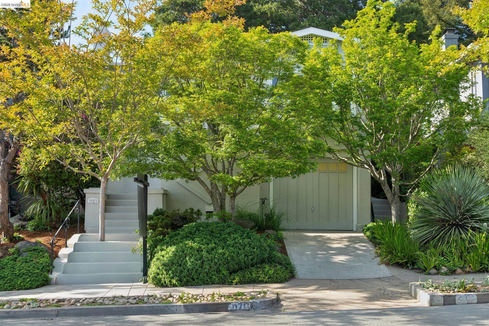 1121 Ranleigh Way Piedmont, CA 94610 - Photo 3 of 50 a view of a house with a tree