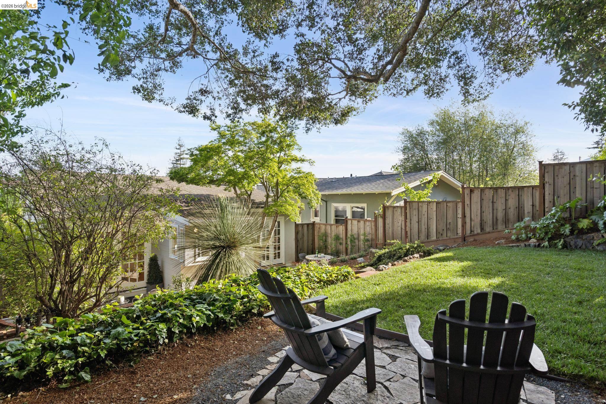 1121 Ranleigh Way Piedmont, CA 94610 - Photo 34 of 50 a view of a chairs and table in the backyard