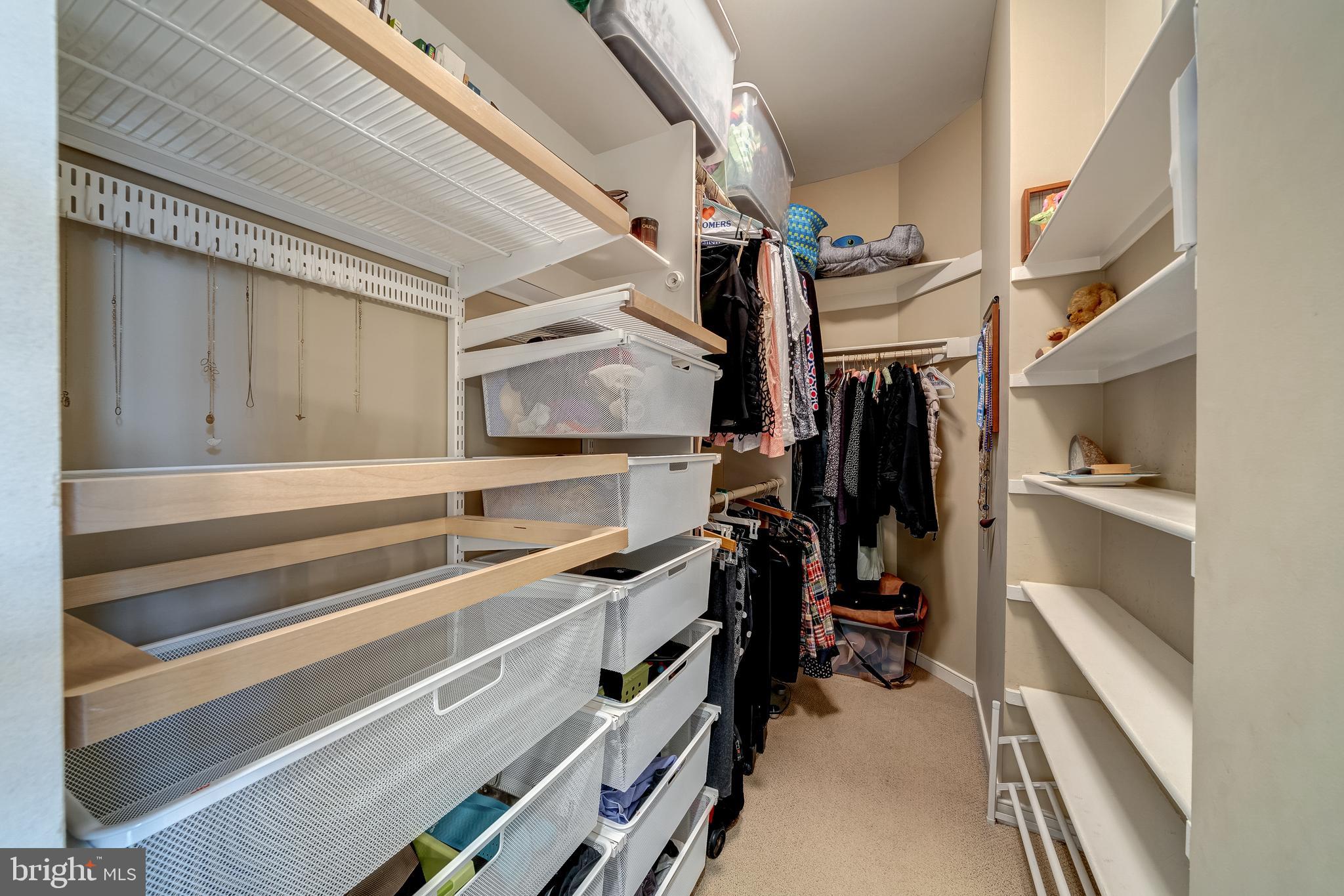 1433 Waterfront Road Reston, VA 20194 - Photo 39 of 67 Primary Bedroom -His and Her Walk-In Closets