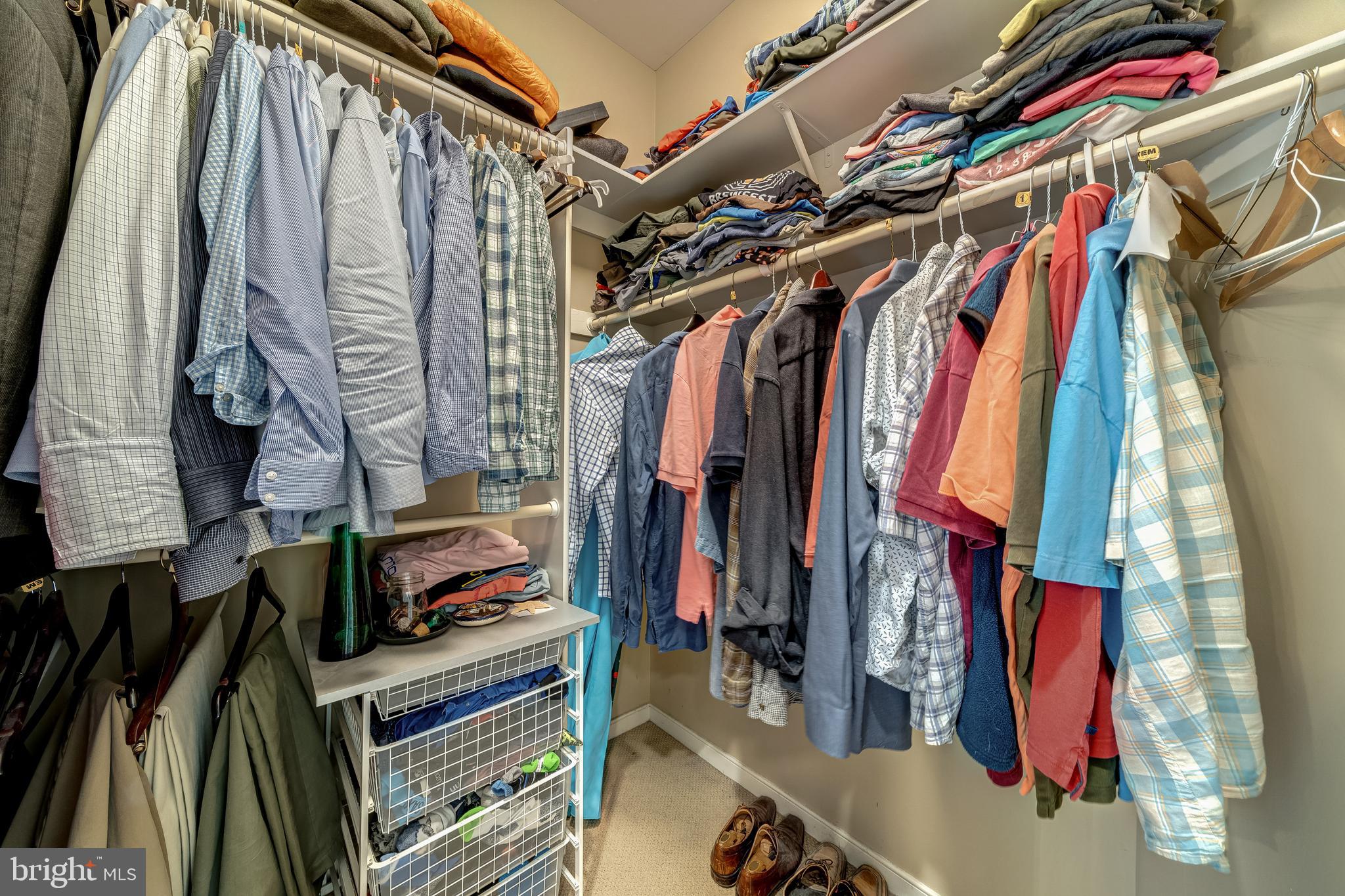 1433 Waterfront Road Reston, VA 20194 - Photo 40 of 67 Primary Bedroom -His and Her Walk-In Closets