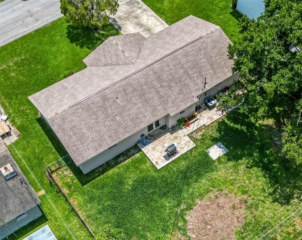 2814 William Lane Lakeland, FL 33812 - Photo 17 of 18 a aerial view of a house with a yard and large trees
