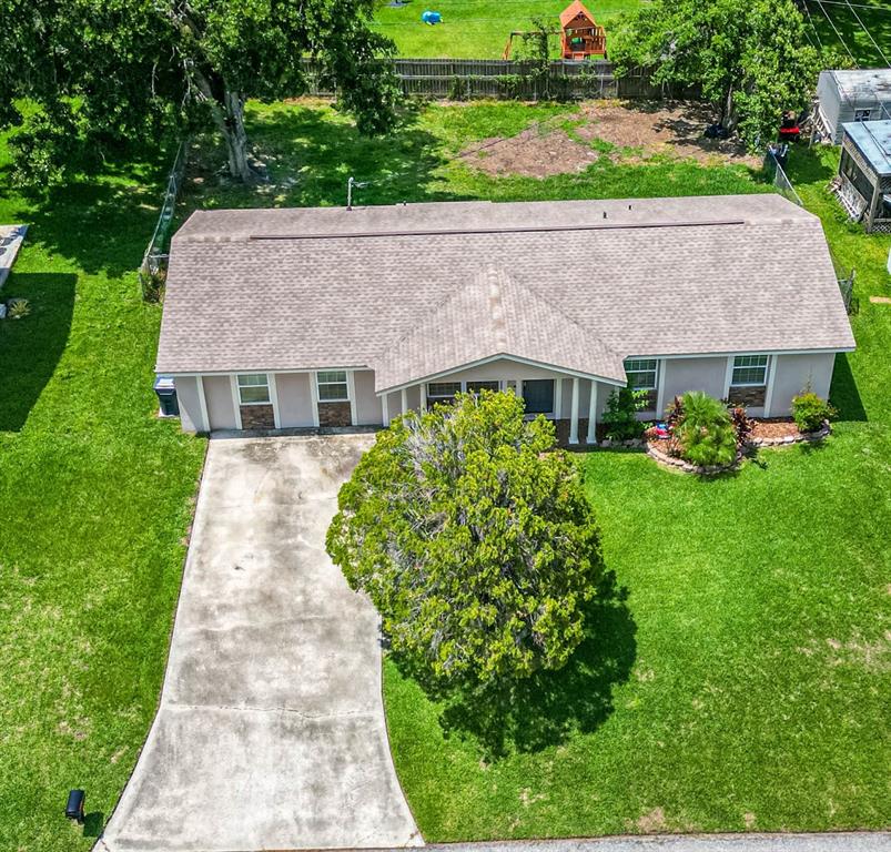 2814 William Lane Lakeland, FL 33812 - Photo 18 of 18 a aerial view of a house with a yard