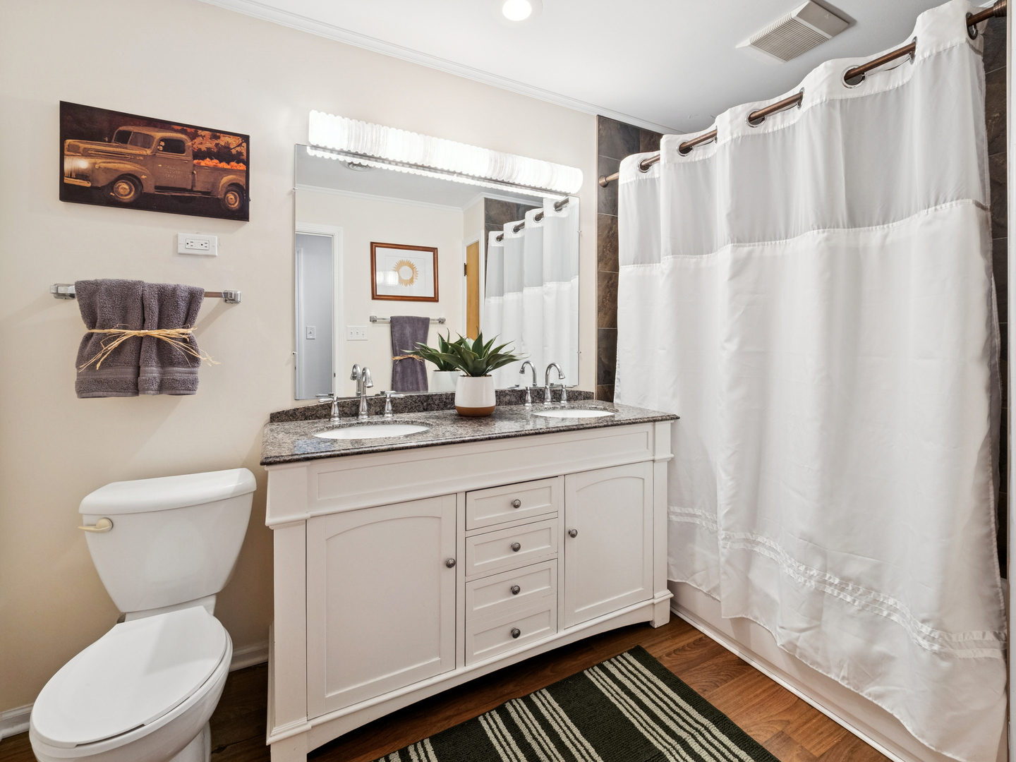 295 Ardmore Road Des Plaines, IL 60016 - Photo 15 of 30 a bathroom with a granite countertop sink toilet and shower