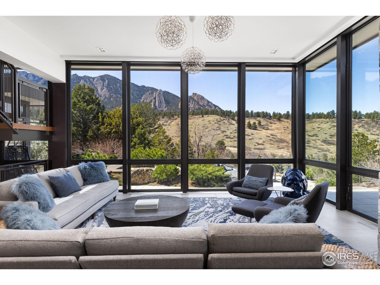 1775 Deer Valley Road Boulder, CO 80305 - Photo 1 of 40 a living room with furniture and a large window