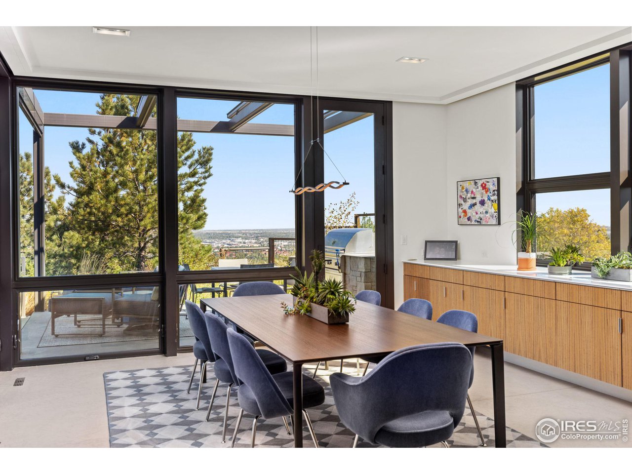 1775 Deer Valley Road Boulder, CO 80305 - Photo 15 of 40 a view of a dining room with furniture window and outside view