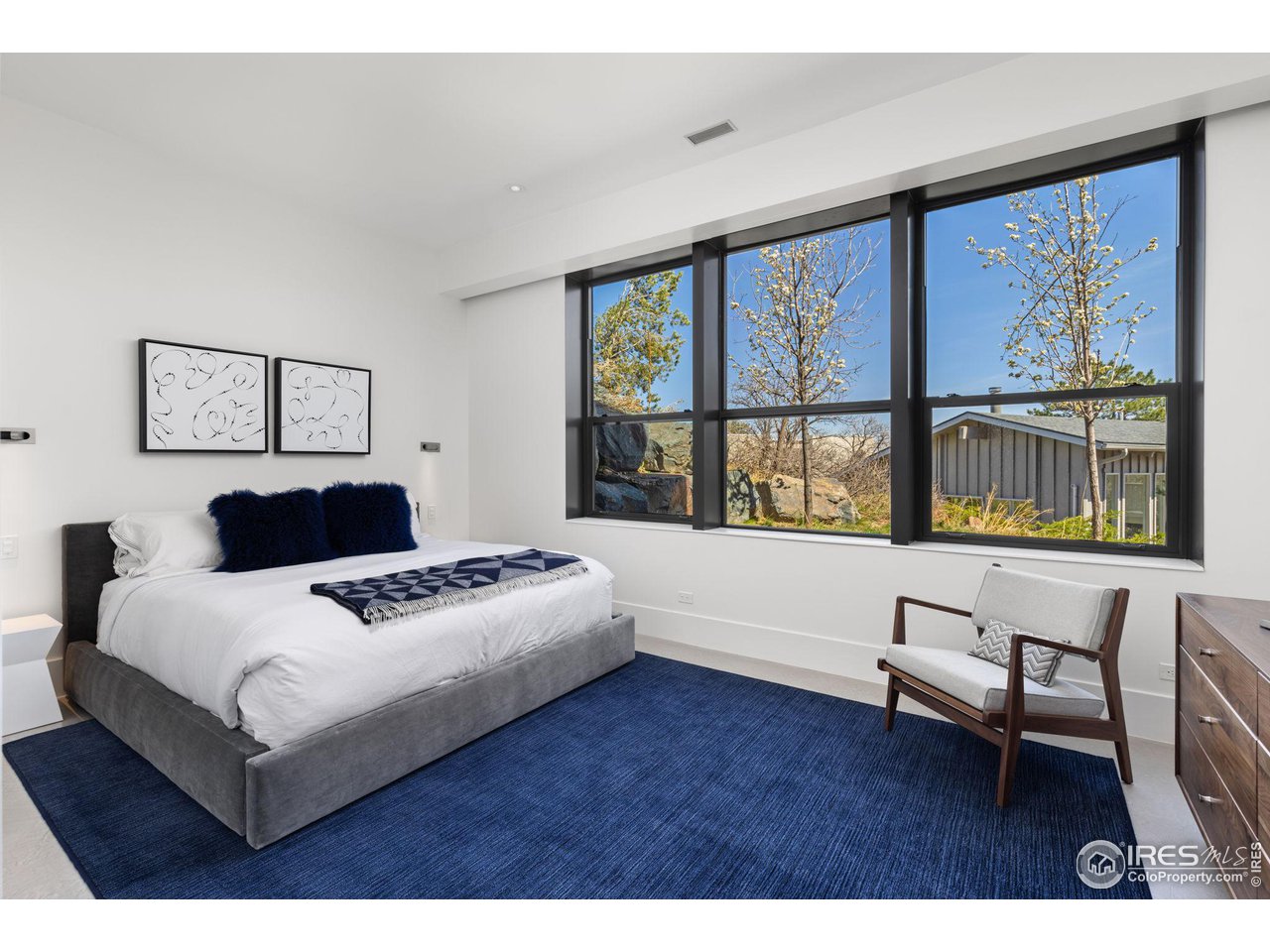 1775 Deer Valley Road Boulder, CO 80305 - Photo 32 of 40 a living room with furniture and a large window