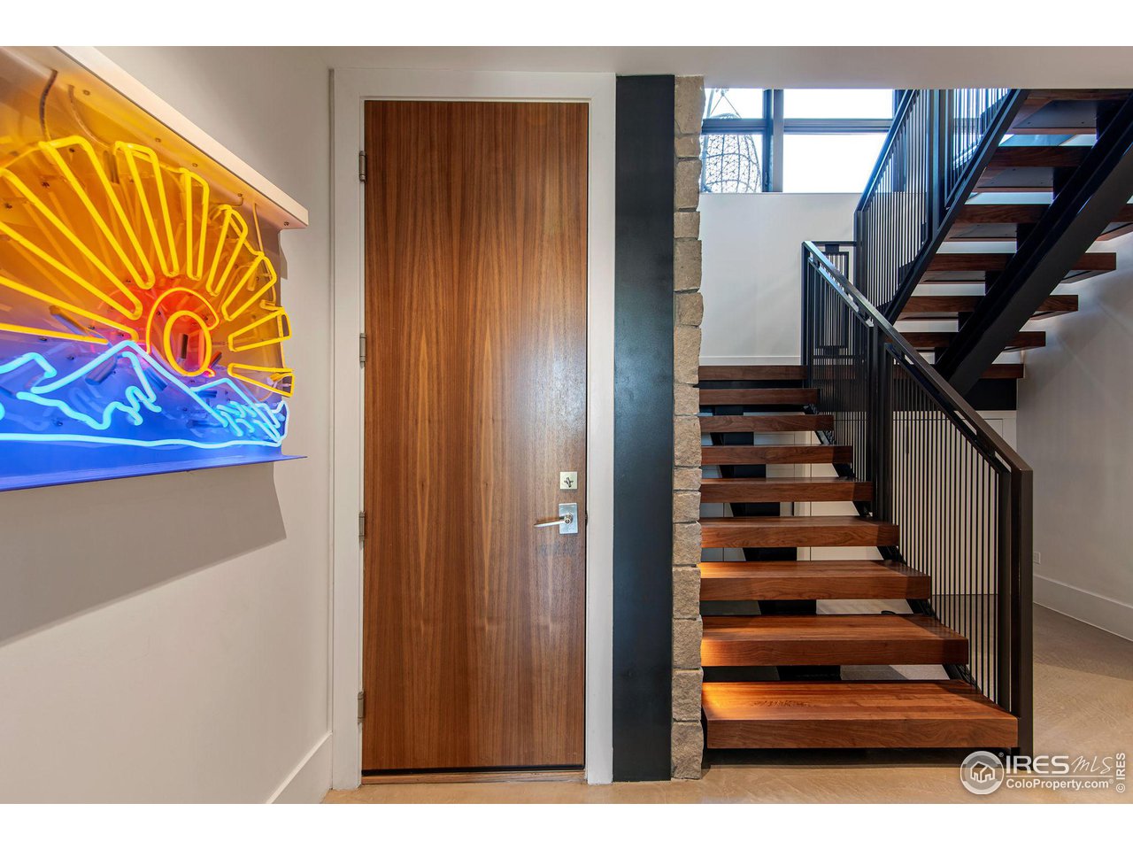 1775 Deer Valley Road Boulder, CO 80305 - Photo 36 of 40 a view of entryway with wooden floor