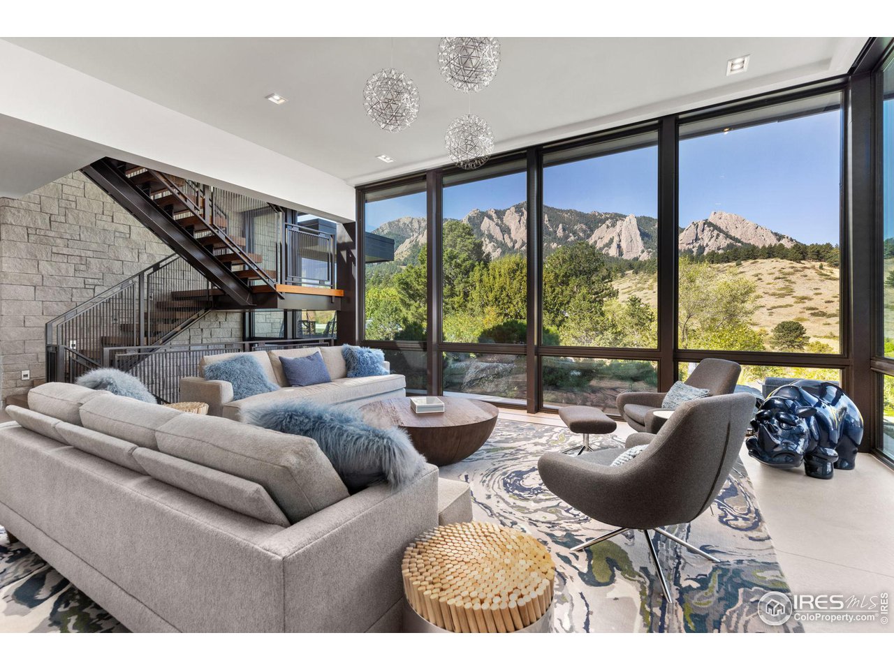 1775 Deer Valley Road Boulder, CO 80305 - Photo 4 of 40 a living room with furniture and floor to ceiling windows