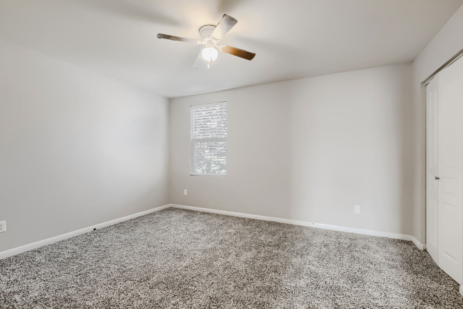 5136 Hellman Kyle, TX 78640 - Photo 19 of 25 an empty room with a window and a fan