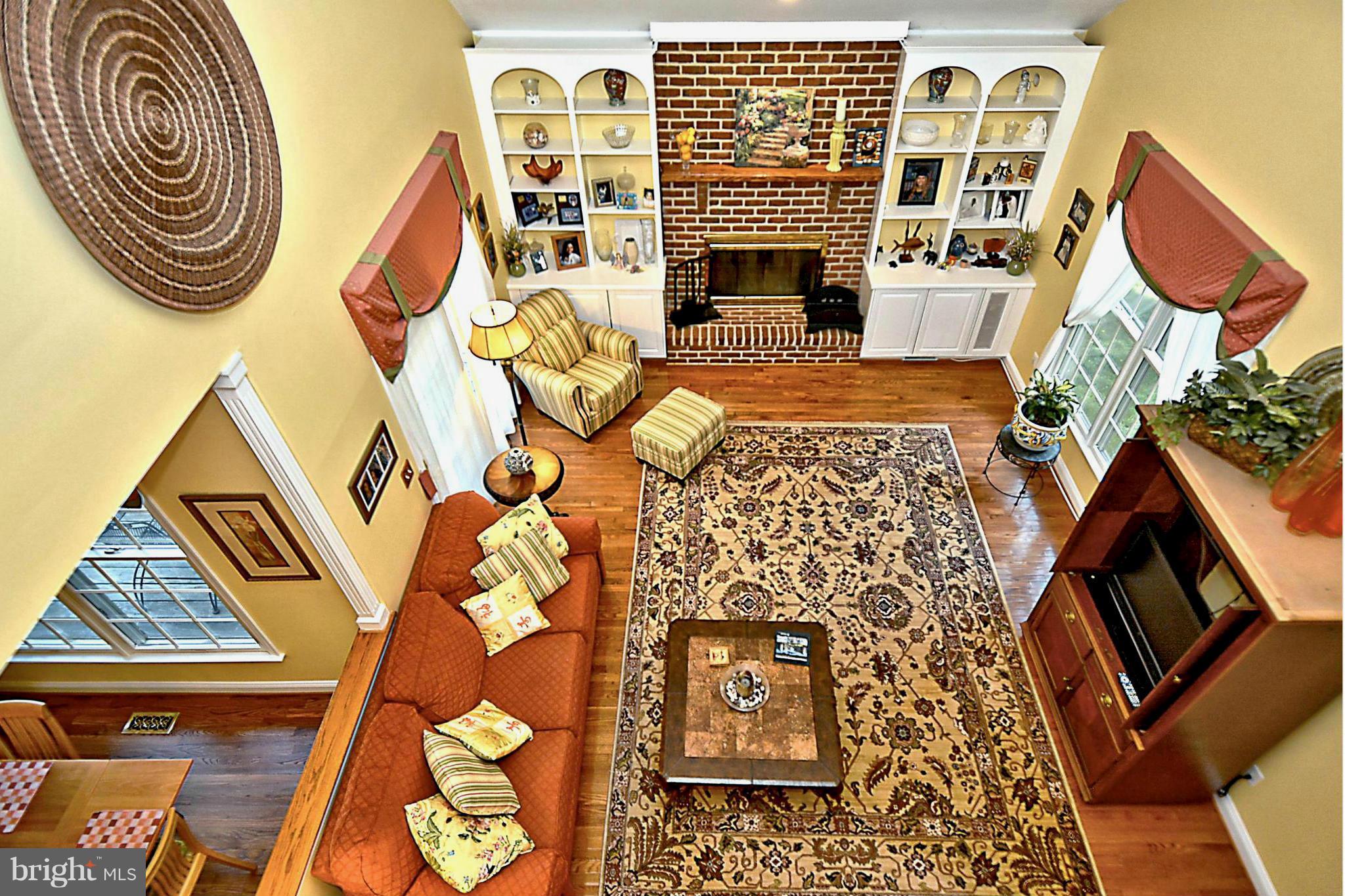 2702 Howard Grove Road Davidsonville, MD 21035 - Photo 14 of 30 Two-Story Family Room with Gathering Fireplace