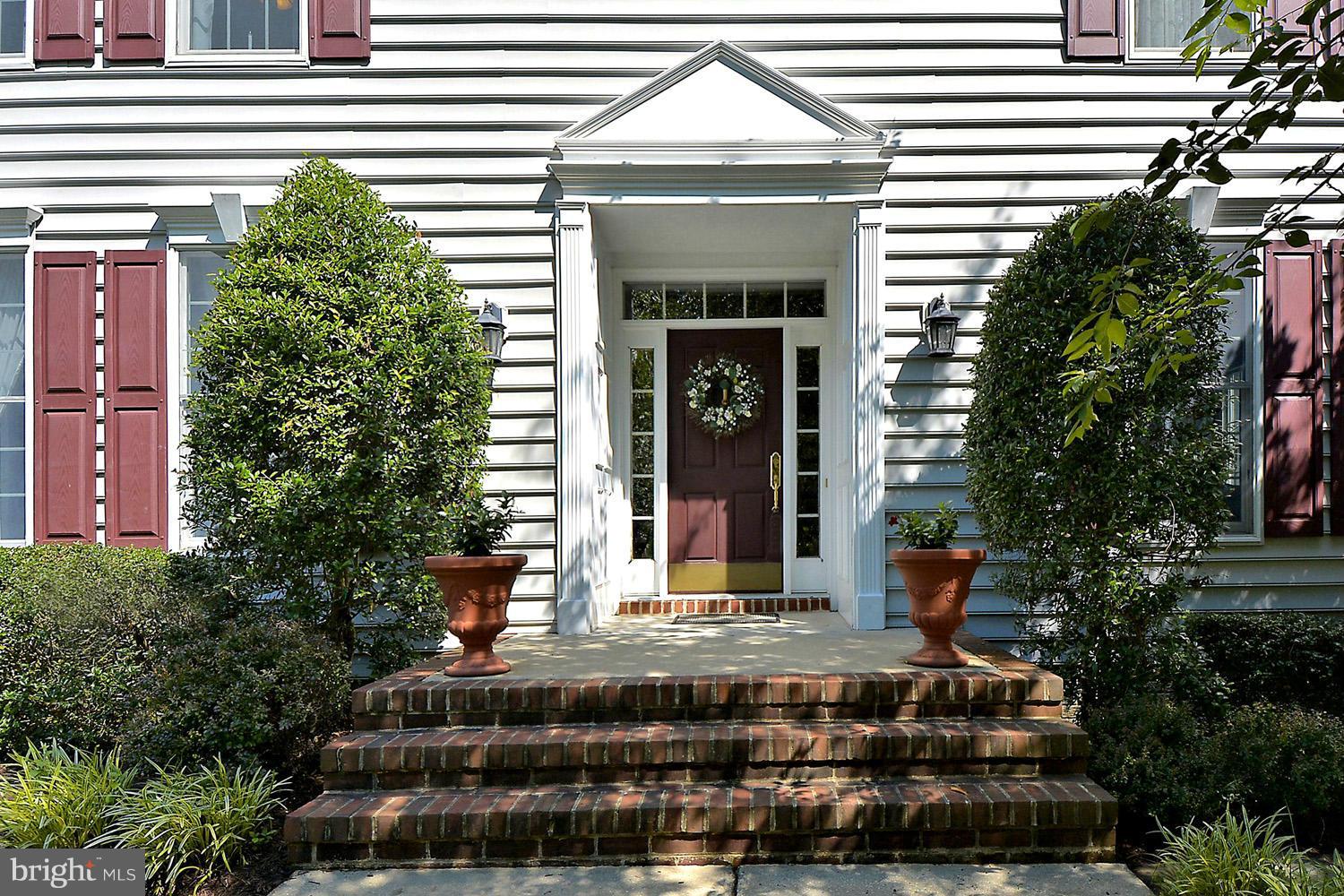 2702 Howard Grove Road Davidsonville, MD 21035 - Photo 6 of 30 Lovingly Cultivated Landscaping / Stately Entry