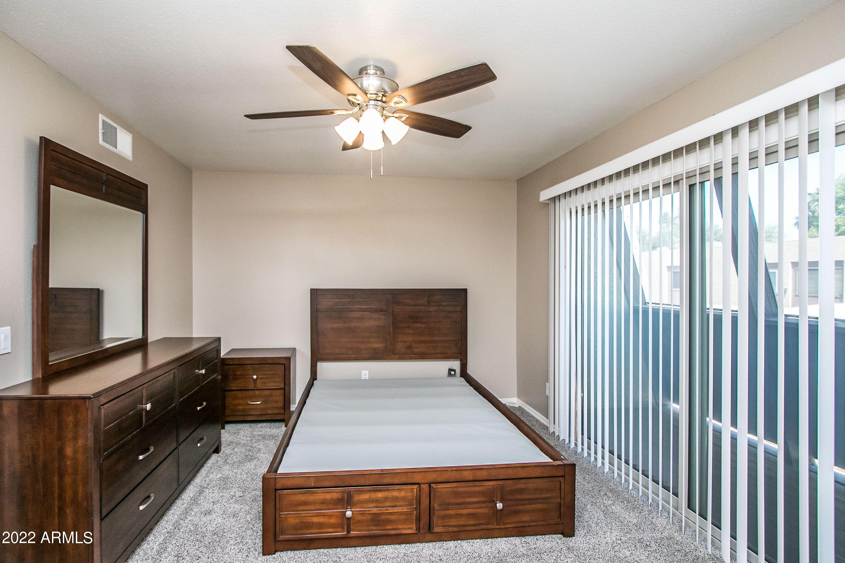 626 West 14th Street Tempe, AZ 85281 - Photo 20 of 27 a living room with furniture and a flat screen tv