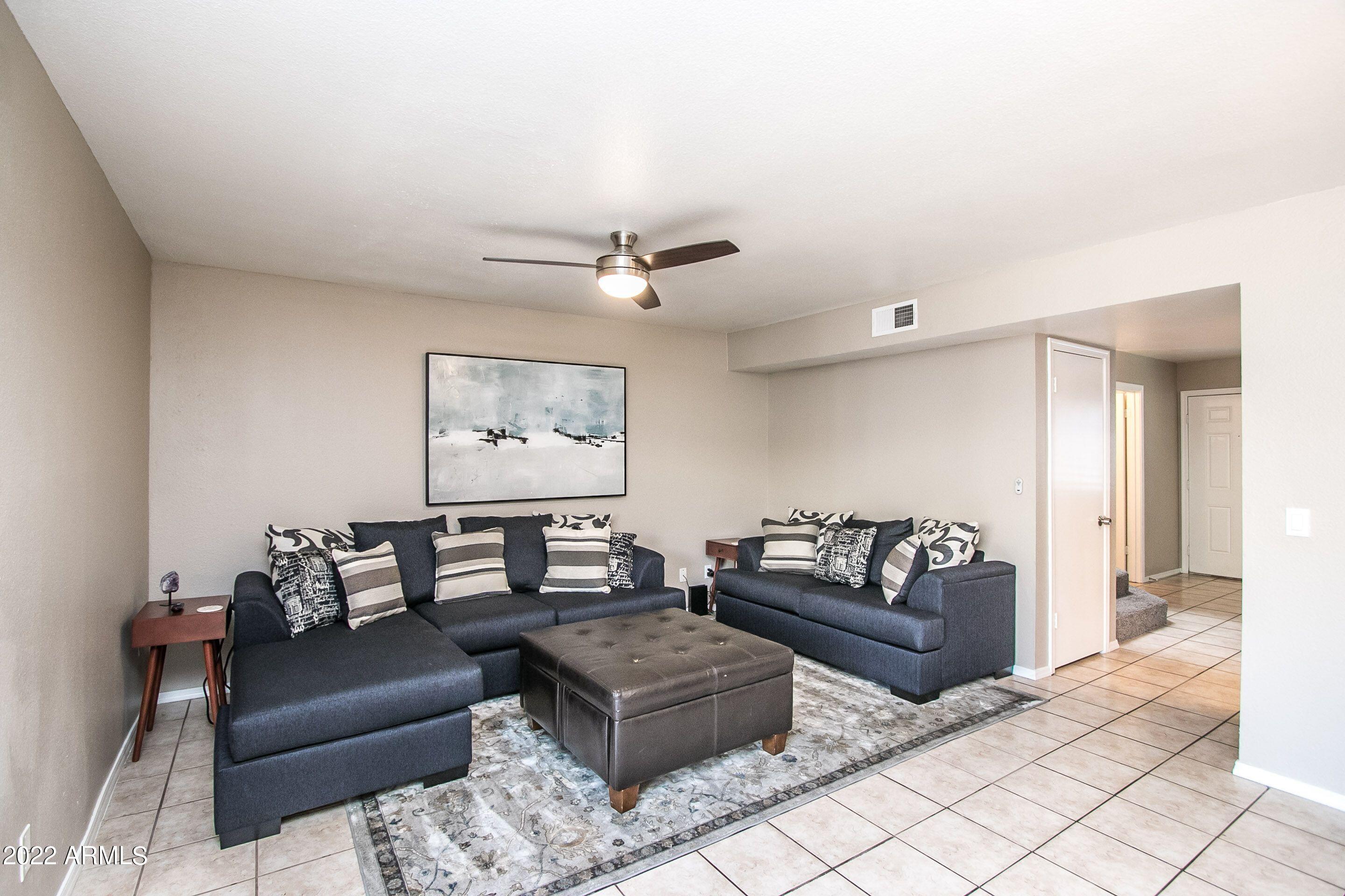 626 West 14th Street Tempe, AZ 85281 - Photo 7 of 27 a living room with furniture and a ceiling fan