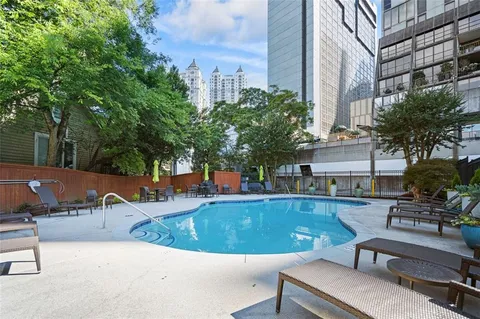 an outdoor view of the house and swimming pool