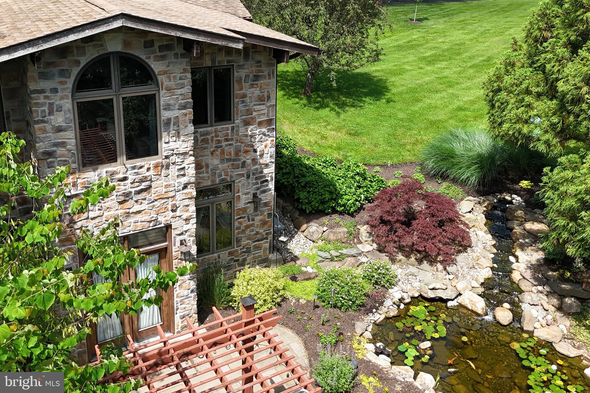 615 Scotch Road Pennington, NJ 08534 - Photo 1 of 33 South Elevation with Patio to Conservatory