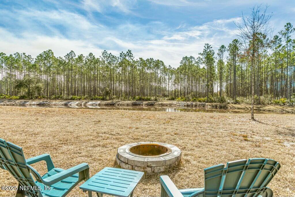 12439 Folsom Road Sanderson, FL 32087 - Photo 11 of 87 Firepit view of pond