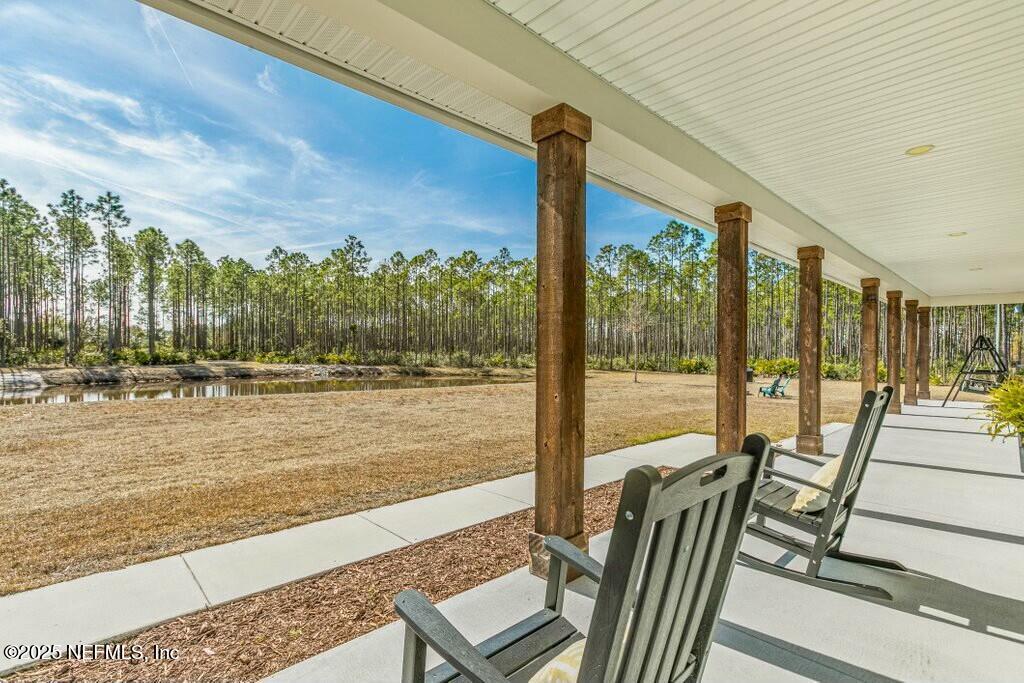 12439 Folsom Road Sanderson, FL 32087 - Photo 14 of 87 Front porch view to pond