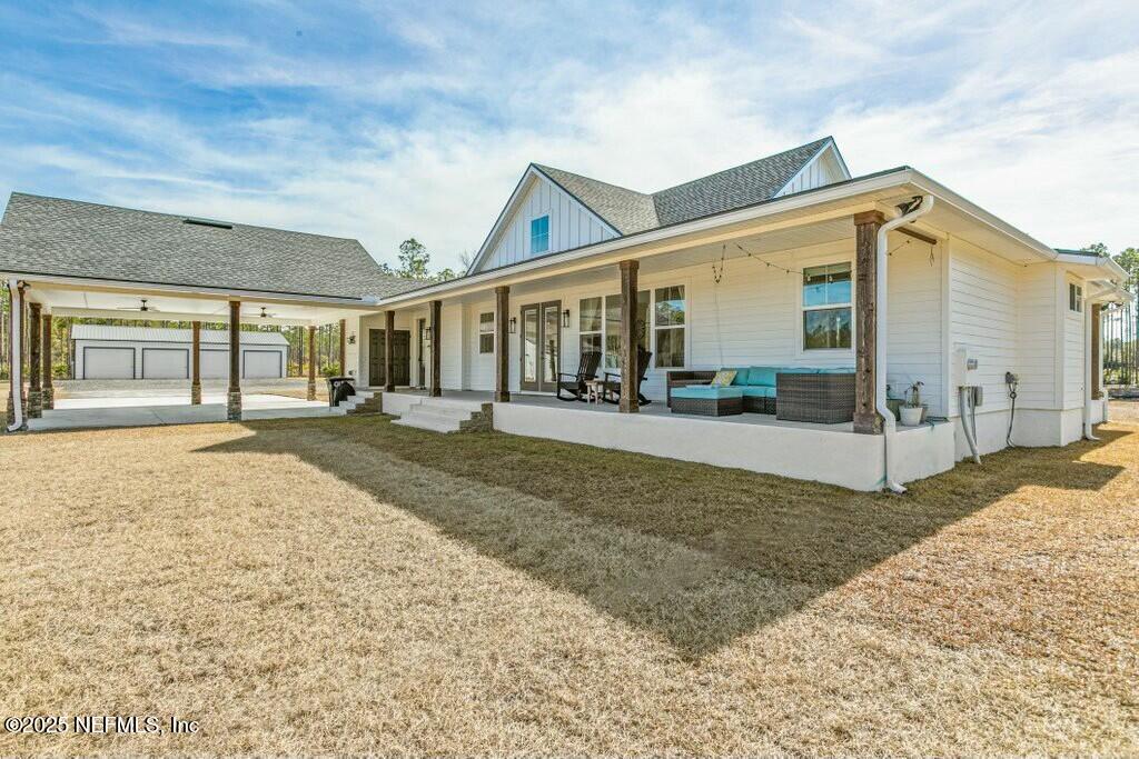 12439 Folsom Road Sanderson, FL 32087 - Photo 16 of 87 Rear porch and carport