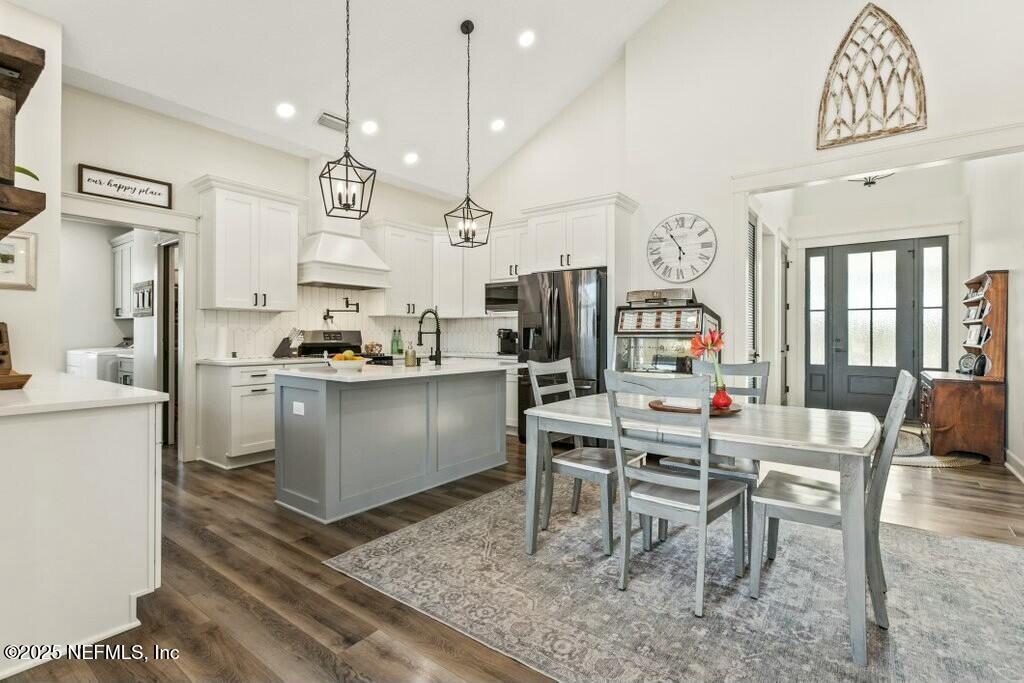 12439 Folsom Road Sanderson, FL 32087 - Photo 32 of 87 Dining to Kitchen