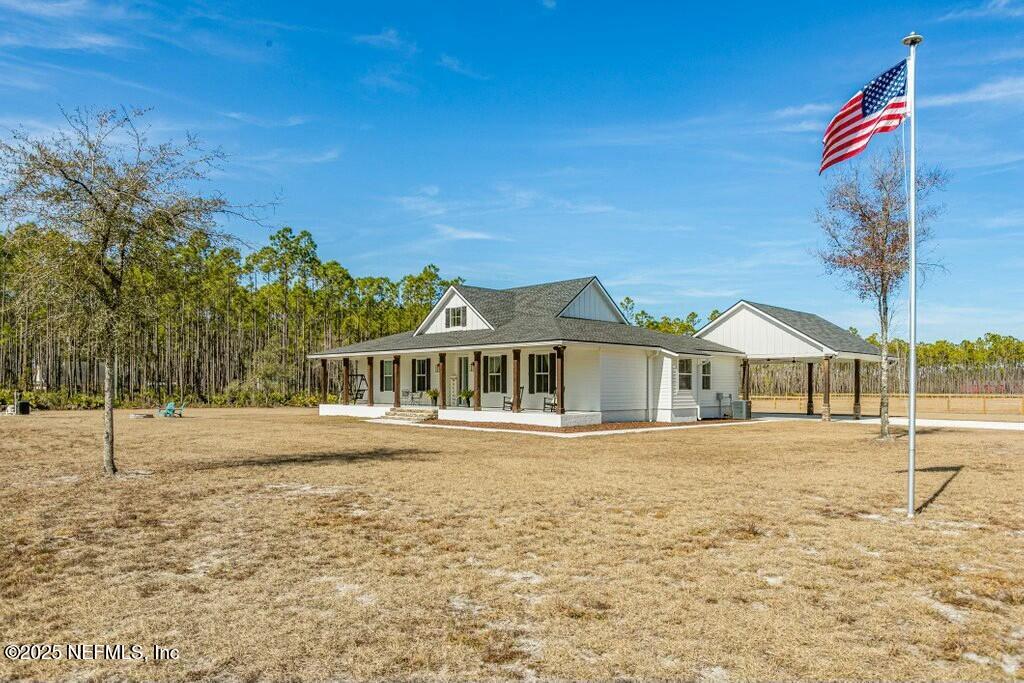 Home with attached carport