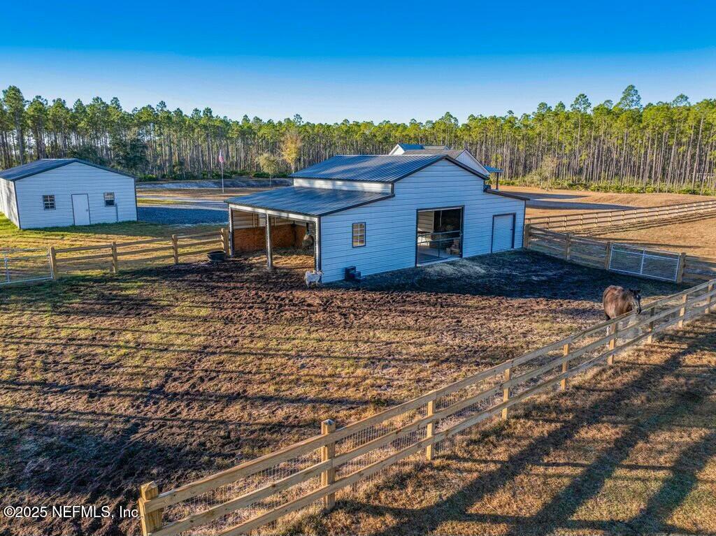 12439 Folsom Road Sanderson, FL 32087 - Photo 86 of 87 Rear view of barn and garage
