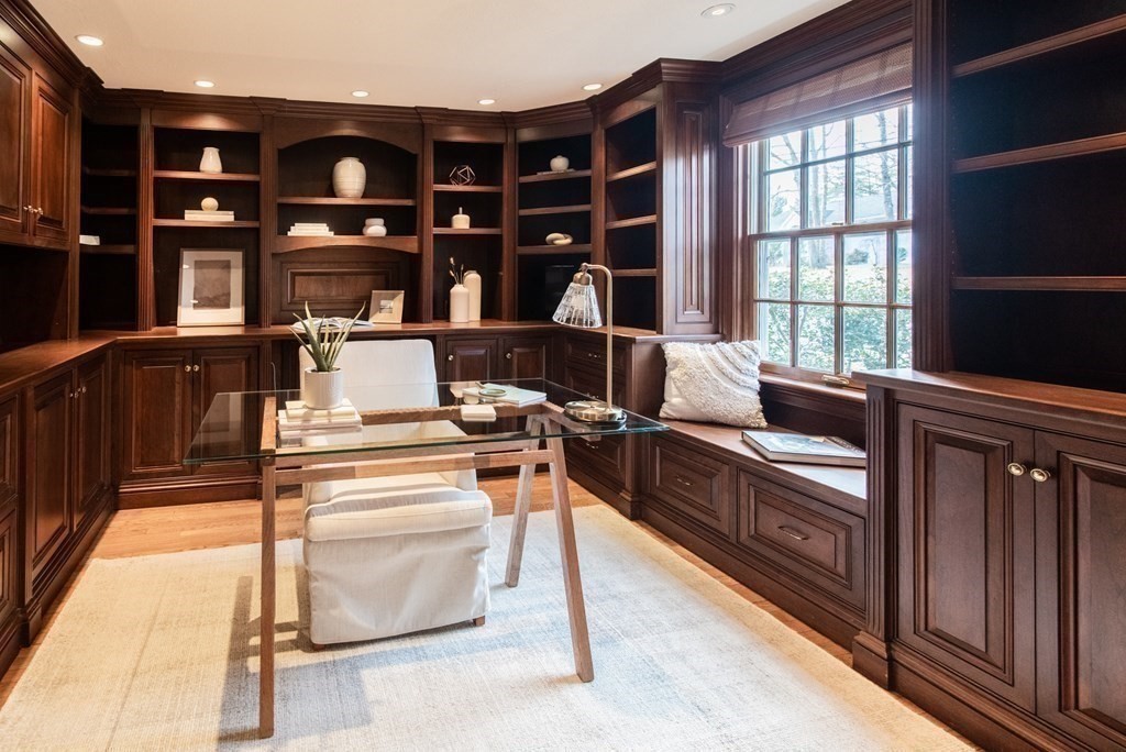 49 Tanglewood Road Wellesley, MA 02481 - Photo 16 of 35 a living room with furniture a window and bookshelf