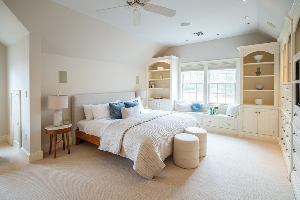 49 Tanglewood Road Wellesley, MA 02481 - Photo 19 of 35 a spacious bedroom with a bed and a large window