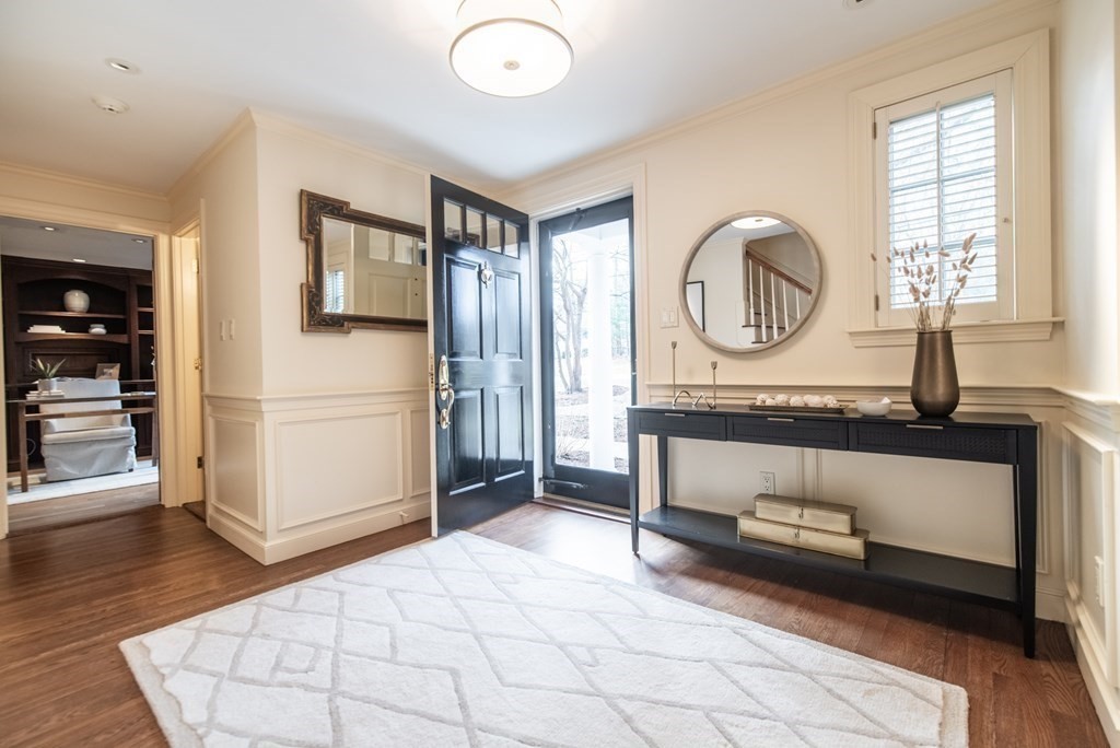 49 Tanglewood Road Wellesley, MA 02481 - Photo 2 of 35 a living room with a bed furniture and a window