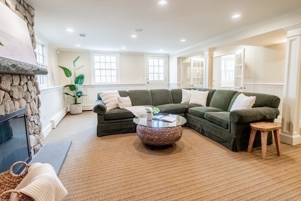 49 Tanglewood Road Wellesley, MA 02481 - Photo 28 of 35 a living room with furniture and a wooden floor