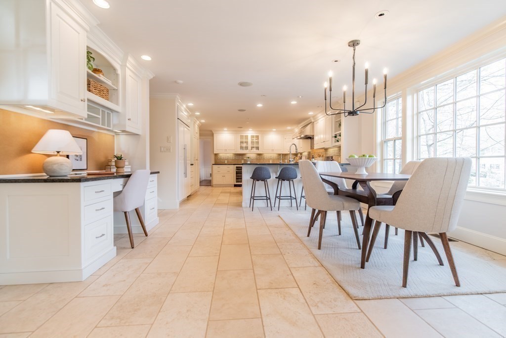 49 Tanglewood Road Wellesley, MA 02481 - Photo 9 of 35 a dining room with furniture and a chandelier