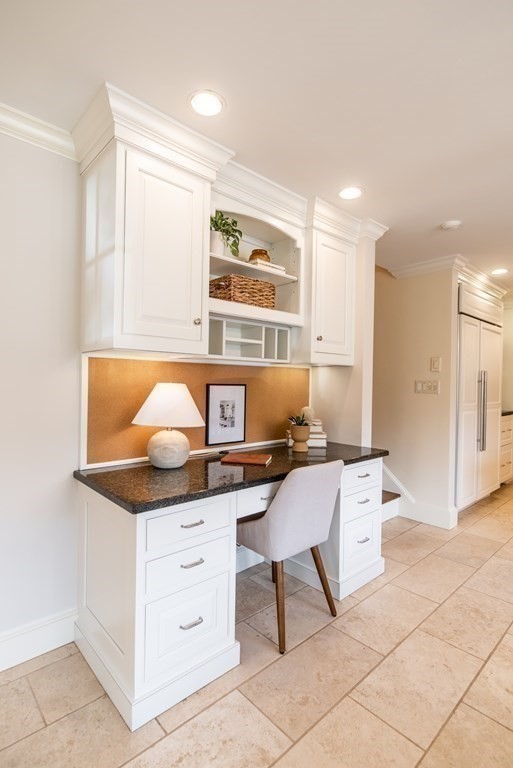 49 Tanglewood Road Wellesley, MA 02481 - Photo 10 of 35 a workspace with a large window and chair