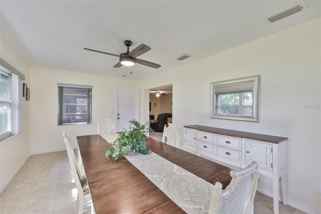 2034 Hawkhurst Circle, Unit 178 Sun City Center, FL 33573 - Photo 27 of 94 a living room with furniture and wooden floor