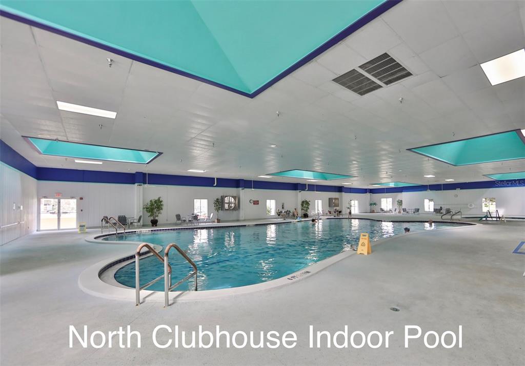 2034 Hawkhurst Circle, Unit 178 Sun City Center, FL 33573 - Photo 53 of 94 a view of a house with a swimming pool